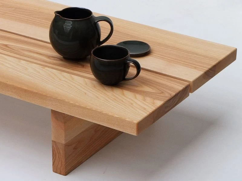 Design-Couchtisch rund aus schwarzem Massivholz – Japandi-Stil für stilvolle Klarheit